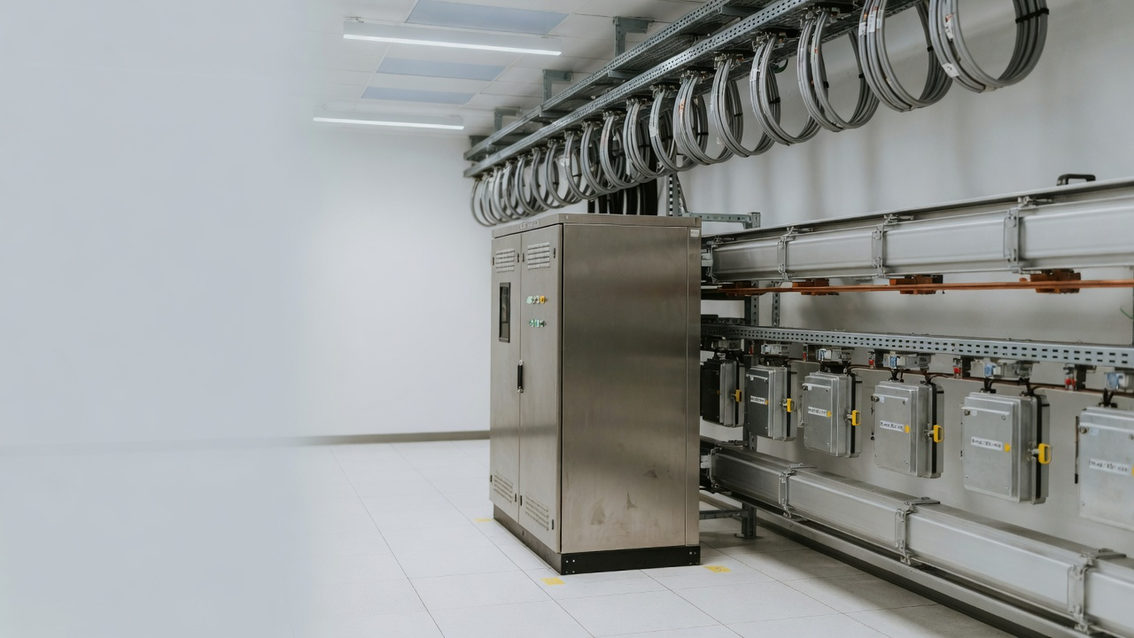 AI-generated editorial image: Modern data center electrical power distribution equipment and overhead busway infrastructure