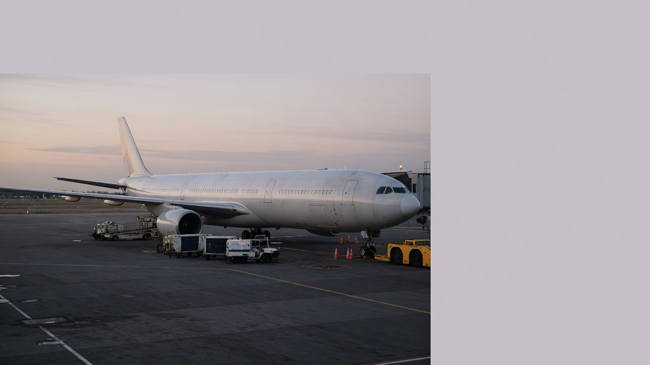 AI-generated editorial image: Commercial aircraft serviced on airport apron at dusk