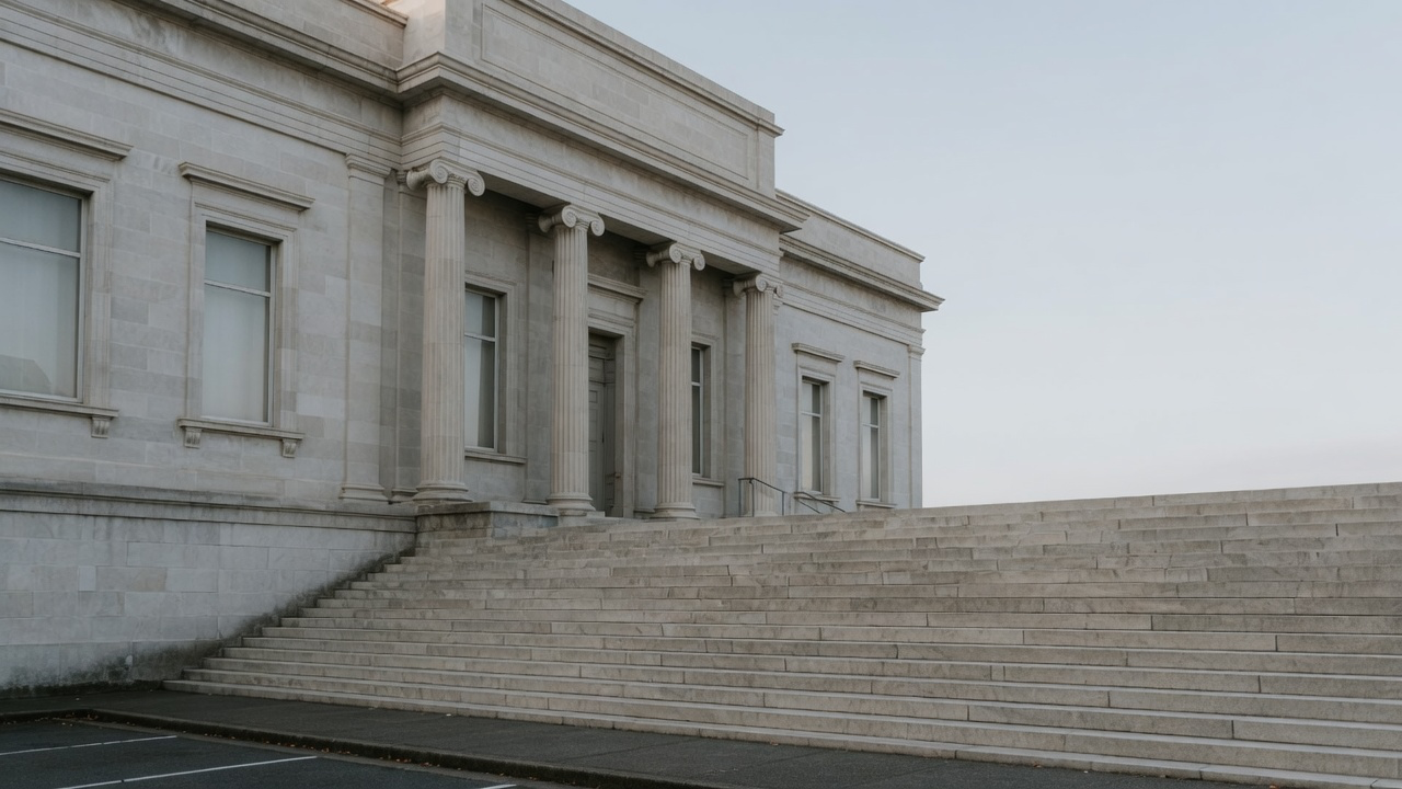 AI-generated editorial image: Restrained institutional Federal Reserve building exterior in soft natural daylight