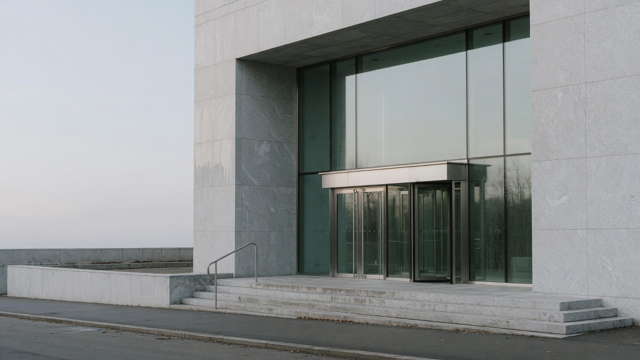 AI-generated editorial image: Modern commercial bank building entrance in morning light representing corporate credit syndication